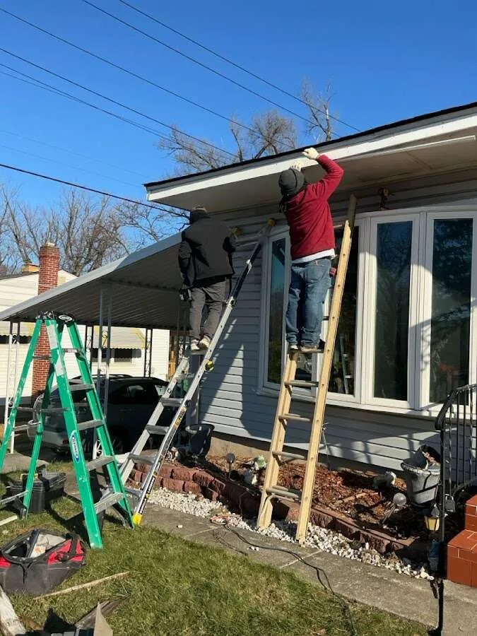 Restoration crew performing exterior repair in Maysville